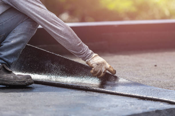 Professional Basement Waterproofing technician working in Valley City, OH